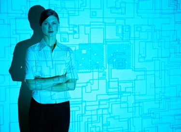 Woman and a Computer Circuit Projection
