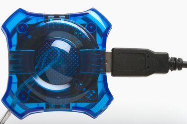Studio shot of usb quad port hub with jack