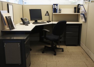Computer with telephone in office